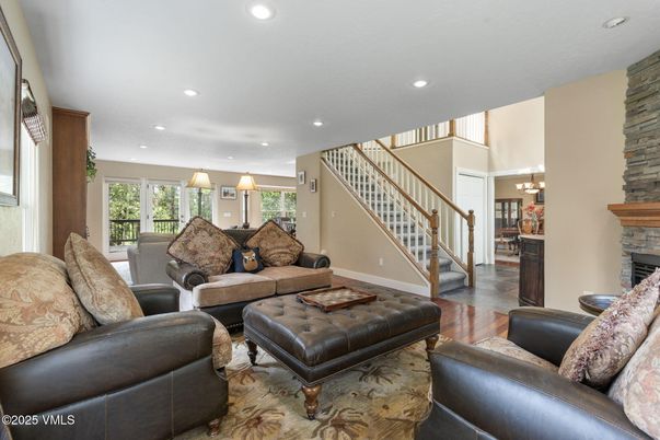 Chandelier, Fireplace, Interior, Living room, Recessed Lighting, Wood Texture Flooring