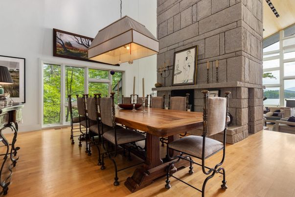 Dining room, Fireplace, Interior, Pendant Lights, Stone Walls, Wood Texture Flooring