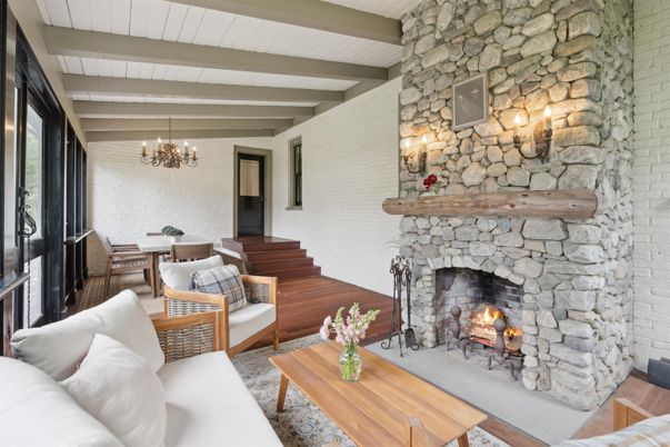 Chandelier, Dining room, Fireplace, Interior, Living room, Stone Walls, Wooden Beams