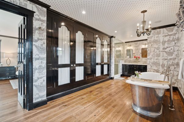 Bathroom, Chandelier, Fireplace, Interior, Marble Walls, Recessed Lighting, Wood Texture Flooring