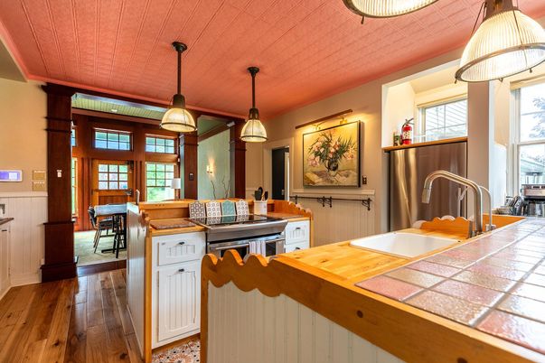 Interior, Kitchen, Pendant Lights, Tile Countertops, Wood Texture Flooring