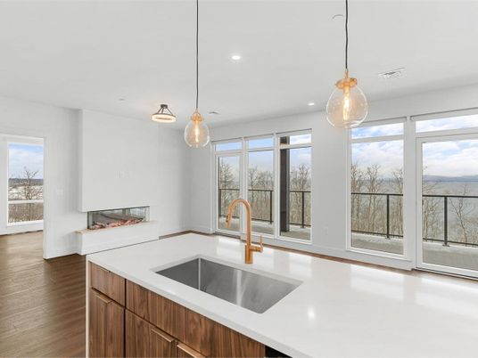Fireplace, Interior, Kitchen, Pendant Lights, Recessed Lighting, Water, Wood Texture Flooring
