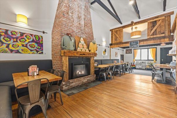 Dining room, Fireplace, Interior, Pendant Lights, Stone Walls, Wood Texture Flooring