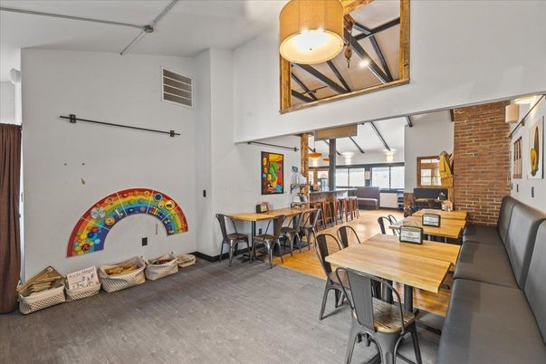Dining room, Fireplace, Interior, Pendant Lights, Stone Walls, Wood Texture Flooring