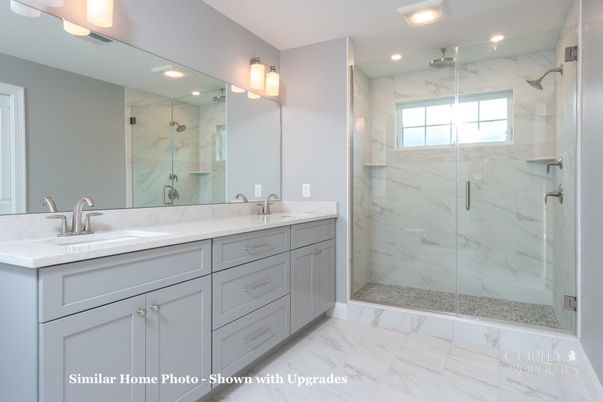Bathroom, Dual Sink Vanities, Glass Shower, Interior, Marble, Marble Walls, Recessed Lighting