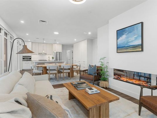 Dining room, Fireplace, Interior, Kitchen, Living room, Pendant Lights, Recessed Lighting, Stainless Steel Appliances, Wood Texture Flooring