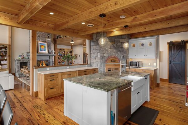 Fireplace, Interior, Kitchen, Pendant Lights, Recessed Lighting, Stainless Steel Appliances, Stone Walls, Wooden Beams, Wooden Ceilings, Wood Texture Flooring