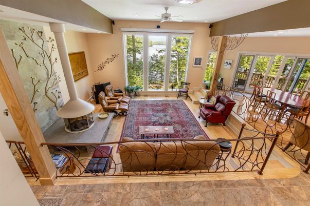Dining room, Fireplace, Interior, Living room, Recessed Lighting, Wood Texture Flooring