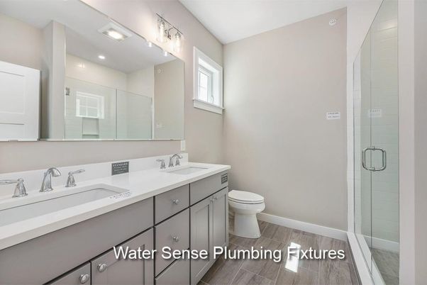 Bathroom, Dual Sink Vanities, Glass Shower, Interior, Recessed Lighting, Wood Texture Flooring