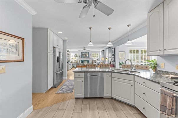 Dining room, Interior, Kitchen, Pendant Lights, Recessed Lighting, Stainless Steel Appliances, Wood Texture Flooring