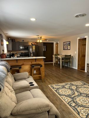 Dining room, Interior, Kitchen, Living room, Pendant Lights, Recessed Lighting, Stainless Steel Appliances, Wood Texture Flooring