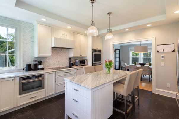 Dining room, Interior, Kitchen, Pendant Lights, Recessed Lighting, Stainless Steel Appliances, Wood Texture Flooring