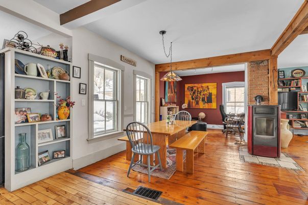 Dining room, Fireplace, Interior, Pendant Lights, Stone Walls, Wooden Beams, Wood Texture Flooring