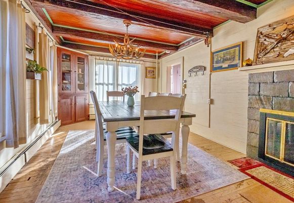 Chandelier, Dining room, Fireplace, Interior, Stone Walls, Wooden Beams, Wooden Ceilings, Wood Texture Flooring