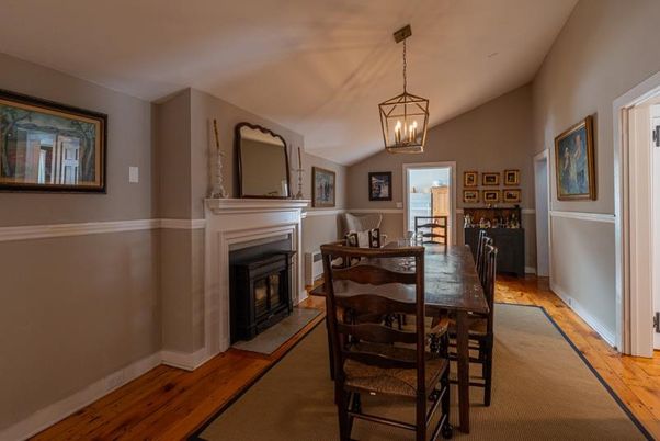 Dining room, Fireplace, Interior, Pendant Lights, Wood Texture Flooring