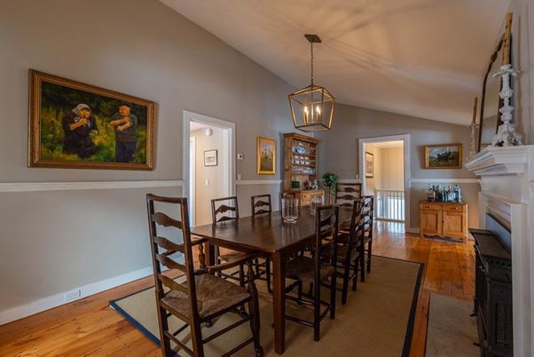 Dining room, Fireplace, Interior, Pendant Lights, Wood Texture Flooring