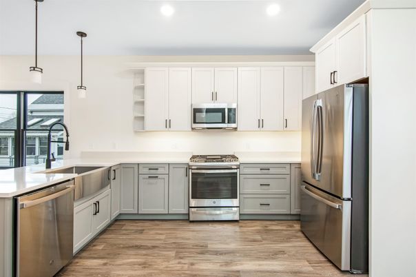 Interior, Kitchen, Pendant Lights, Recessed Lighting, Stainless Steel Appliances, Wood Texture Flooring