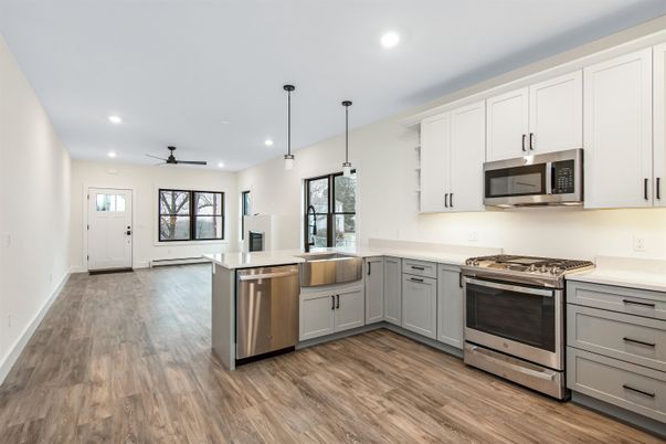 Interior, Kitchen, Pendant Lights, Recessed Lighting, Stainless Steel Appliances, Wood Texture Flooring
