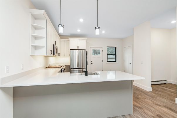 Interior, Kitchen, Pendant Lights, Recessed Lighting, Stainless Steel Appliances, Wood Texture Flooring