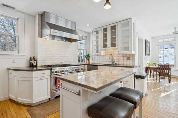 Dining room, Interior, Kitchen, Recessed Lighting, Stainless Steel Appliances, Wood Texture Flooring