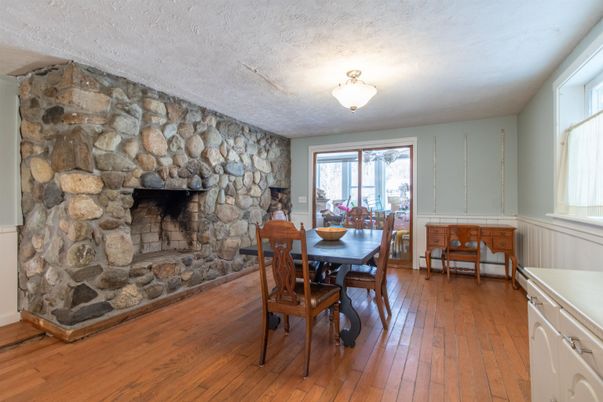 Dining room, Fireplace, Interior, Stone Walls, Wood Texture Flooring