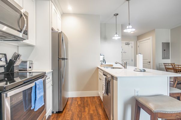 Interior, Kitchen, Pendant Lights, Recessed Lighting, Stainless Steel Appliances, Wood Texture Flooring