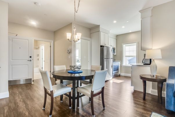 Chandelier, Dining room, Interior, Kitchen, Pendant Lights, Recessed Lighting, Stainless Steel Appliances, Wood Texture Flooring