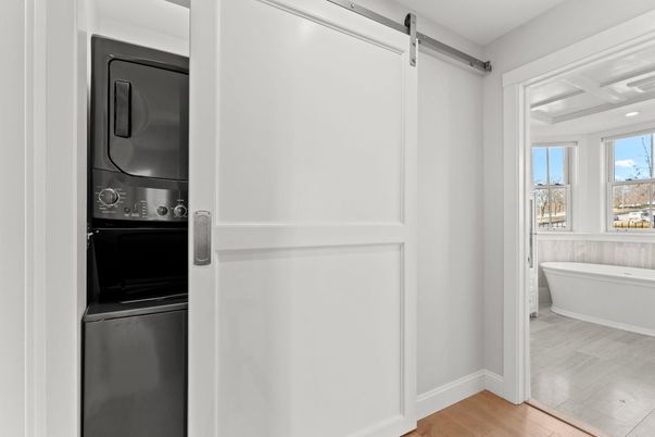 Bathroom, Interior, Recessed Lighting, Utility Closets, Washer, Wood Texture Flooring