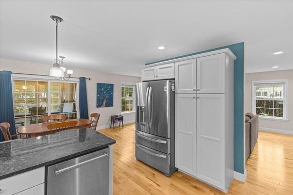 Dining room, Interior, Kitchen, Pendant Lights, Recessed Lighting, Stainless Steel Appliances, Wood Texture Flooring