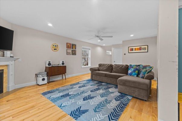 Fireplace, Interior, Living room, Recessed Lighting, Wood Texture Flooring