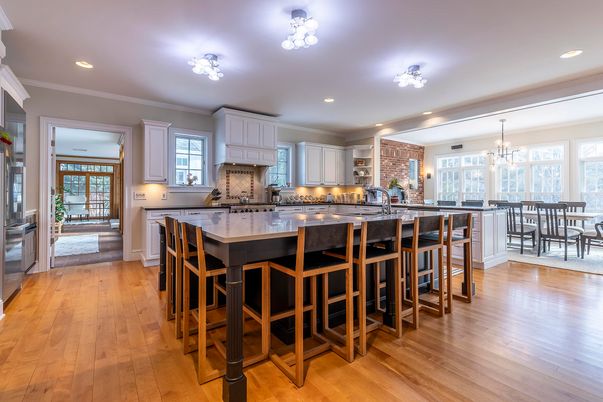 Chandelier, Dining room, Interior, Kitchen, Recessed Lighting, Stainless Steel Appliances, Wood Texture Flooring