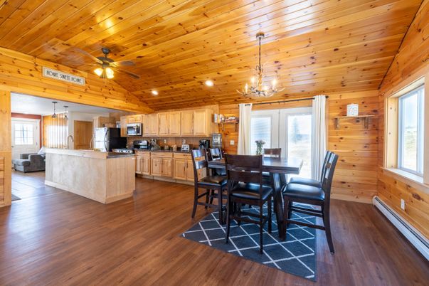 Chandelier, Dining room, Interior, Kitchen, Pendant Lights, Recessed Lighting, Wooden Ceilings, Wood Texture Flooring, Wooden Walls