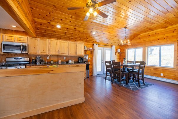 Chandelier, Dining room, Interior, Kitchen, Recessed Lighting, Wooden Beams, Wooden Ceilings, Wood Texture Flooring