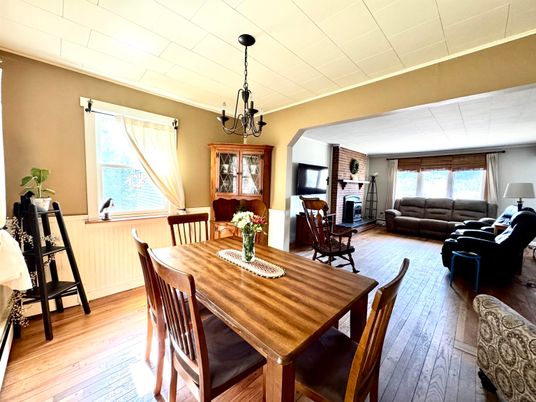 Chandelier, Dining room, Fireplace, Interior, Living room, Wood Texture Flooring