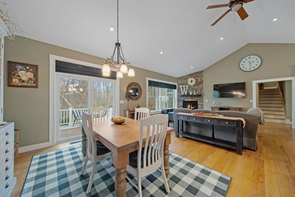 Dining room, Fireplace, Interior, Living room, Pendant Lights, Recessed Lighting, Stone Walls, Wood Texture Flooring