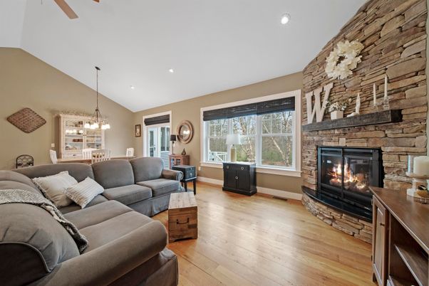 Dining room, Fireplace, Interior, Living room, Pendant Lights, Recessed Lighting, Stone Walls, Wood Texture Flooring