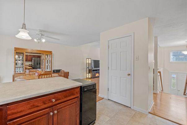 Dining room, Fireplace, Interior, Kitchen, Pendant Lights, Wood Texture Flooring