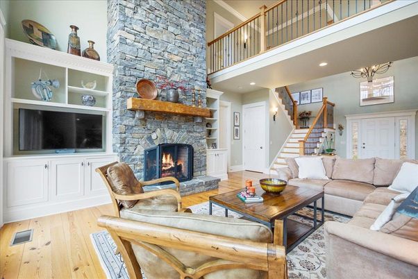 Fireplace, Interior, Living room, Recessed Lighting, Stone Walls, Wood Texture Flooring
