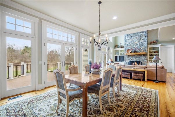 Chandelier, Dining room, Fireplace, Interior, Living room, Recessed Lighting, Stone Walls, Wood Texture Flooring