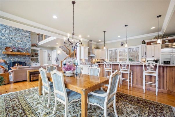 Dining room, Fireplace, Interior, Kitchen, Living room, Pendant Lights, Recessed Lighting, Stainless Steel Appliances, Stone Walls, Wood Texture Flooring