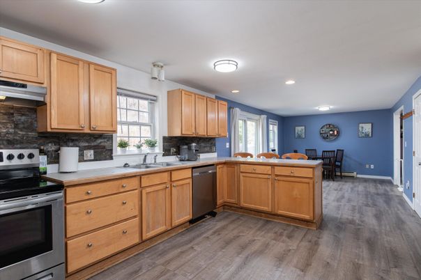 Dining room, Interior, Kitchen, Recessed Lighting, Stainless Steel Appliances, Wood Texture Flooring