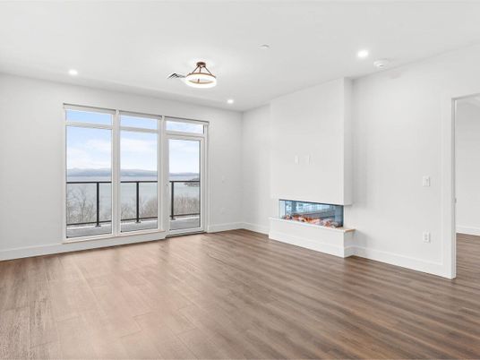 Empty room, Fireplace, Interior, Recessed Lighting, Wood Texture Flooring