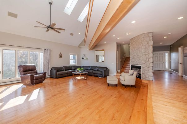 Fireplace, Interior, Living room, Recessed Lighting, Stone Walls, Wooden Beams, Wood Texture Flooring