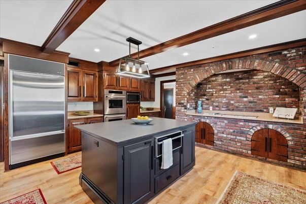 Interior, Kitchen, Pendant Lights, Recessed Lighting, Stainless Steel Appliances, Stone Walls, Wooden Beams, Wood Texture Flooring