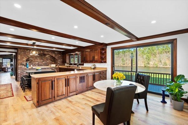 Dining room, Interior, Kitchen, Pendant Lights, Recessed Lighting, Stone Walls, Water, Wooden Beams, Wood Texture Flooring