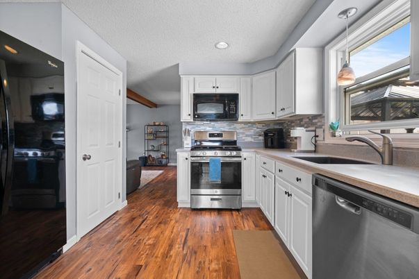 Interior, Kitchen, Pendant Lights, Recessed Lighting, Stainless Steel Appliances, Wood Texture Flooring