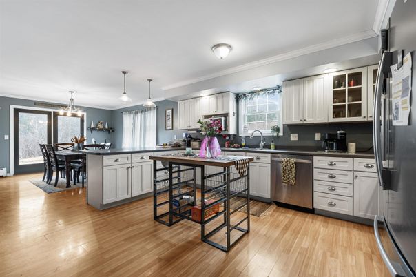 Dining room, Interior, Kitchen, Pendant Lights, Stainless Steel Appliances, Wood Texture Flooring