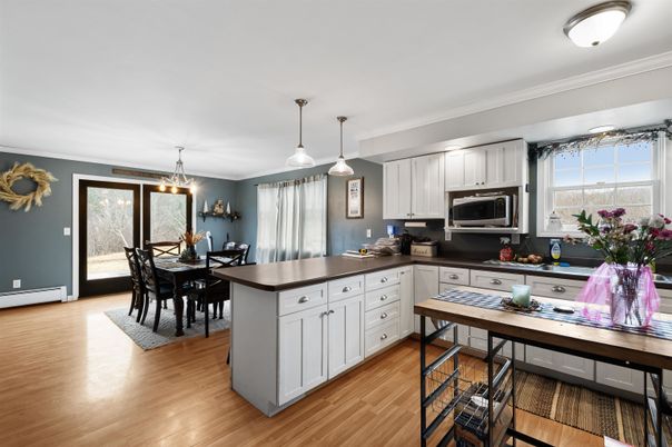 Dining room, Interior, Kitchen, Pendant Lights, Stainless Steel Appliances, Wood Texture Flooring