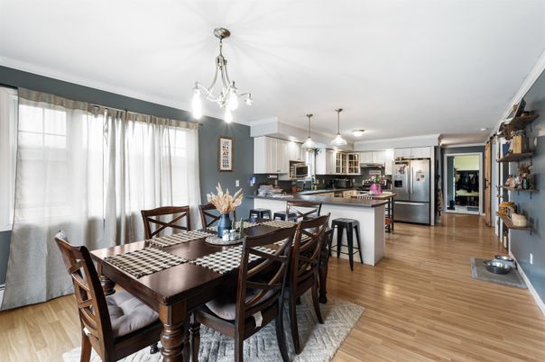 Chandelier, Dining room, Interior, Kitchen, Pendant Lights, Stainless Steel Appliances, Wood Texture Flooring