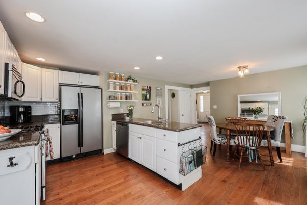 Dining room, Interior, Kitchen, Recessed Lighting, Stainless Steel Appliances, Wood Texture Flooring